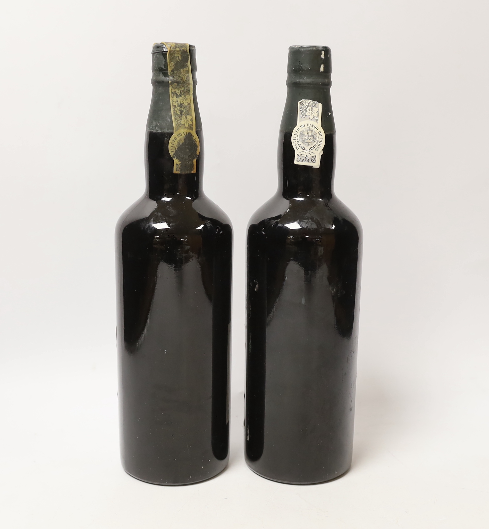 Two bottles of Taylor's Quinta De Vargellas, 1976 vintage port.